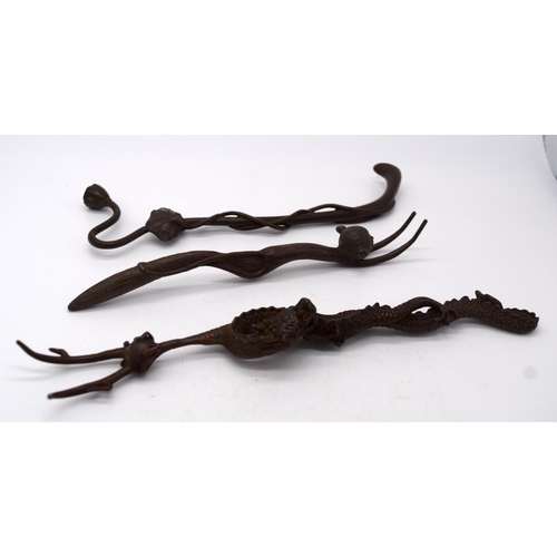 4263 - A Japanese small bronze dragon sculpture together with two others largest 22cm (3).