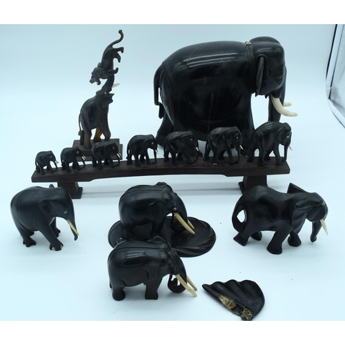 4267 - A collection of hardwood Indian and African Elephants 25 x 20cm (7).