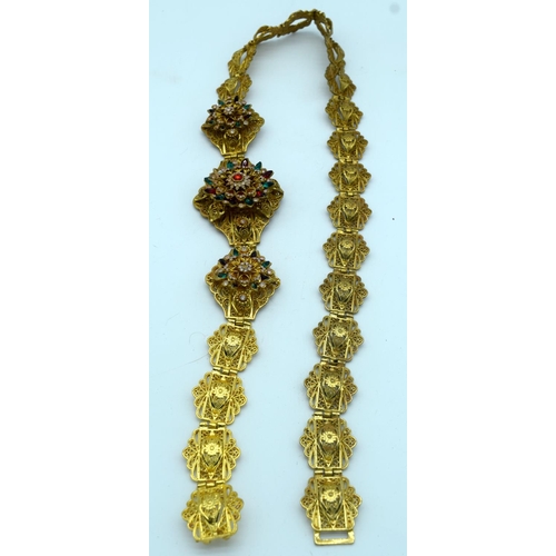 4269 - A Gilt metal belt 110cm.