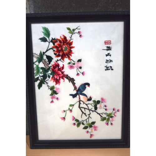 4305 - A framed Chinese silk depicting birds in foliage together with another Chinese picture. (2)