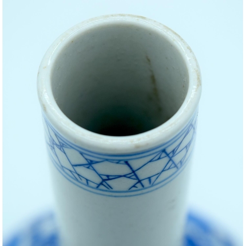 4343 - A Chinese blue and white porcelain vase decorated with foliage .Kangxi mark 28 x 13cm.