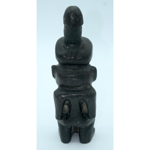 4348 - A Chinese hard stone statue of a male with a penis on his head 26 x 7cm.