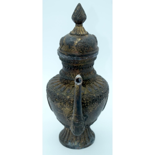 4350 - A bronze  lidded dragon handled Tibetan oil ewer 38 x 28 cm.