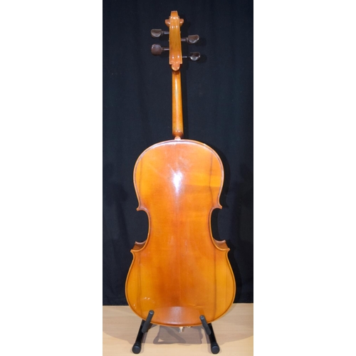 4353 - A Romanian Cello with bow and bag .108 x 38 cm.