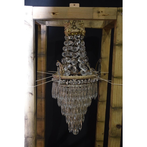 4354 - A 5 tier crystal glass chandelier with a cage  of crystal and Cherubs  56 x 21cm