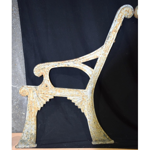 4356 - A pair of Art Deco cast iron bench ends in the style of Christopher Dresser .