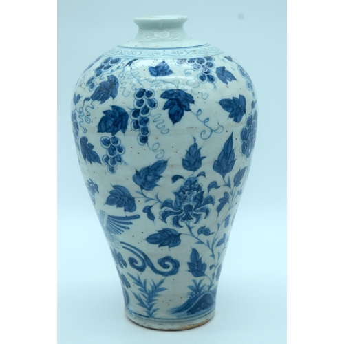 4370 - A Chinese Blue and White Meiping vase decorated with a phoenix and foliage 30cm .