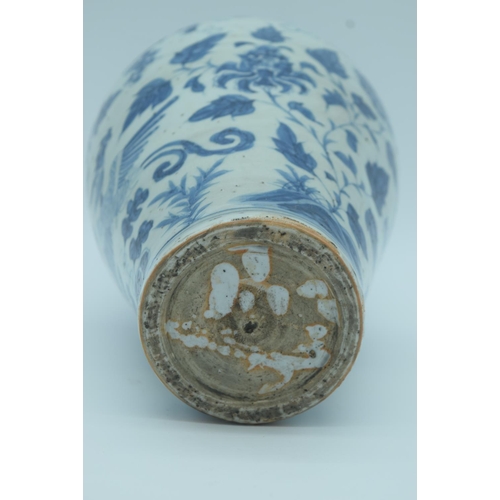 4370 - A Chinese Blue and White Meiping vase decorated with a phoenix and foliage 30cm .