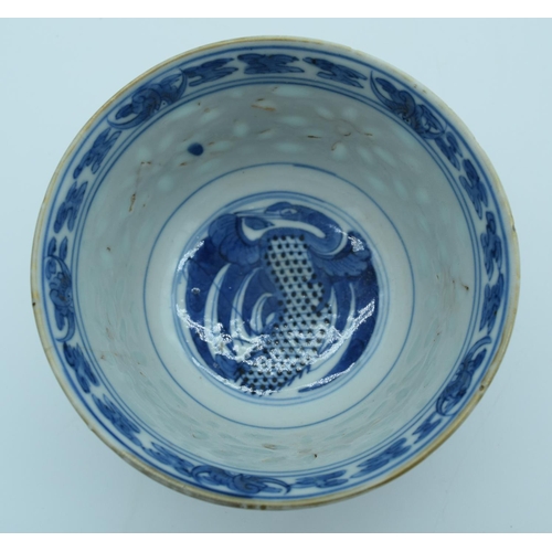 4433 - A small Chinese bowl decorated with  phoenix and foliage 10 x 6cm.