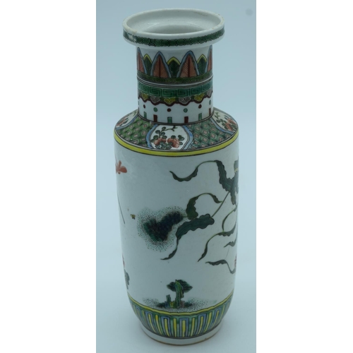 4436 - A Chinese Rouleau vase decorated with birds and foliage 28cm.