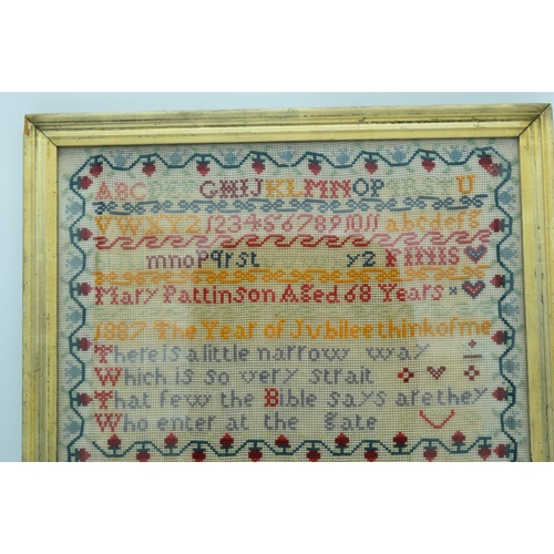 4439 - A Framed Victorian  sampler dated 1887 48 x 43 cm.