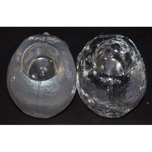 4455 - Two contemporary Swedish glass skulls possibly candle holders 12 x 9 cm