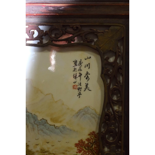 4461 - A framed pair of Republican period porcelain panels decorated with mountains 95 x 34cm(2)