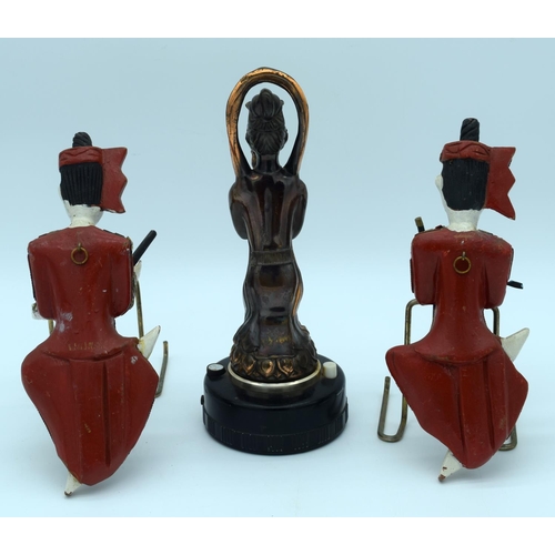 4476 - A vintage Japanese lighter and two wooden Thai figures 29cm . (3)