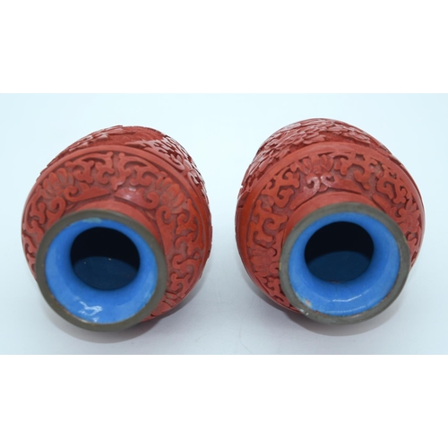 4484 - A small pair of early 20th century Chinese  Cinnabar lacquer vases 13cm . (2)