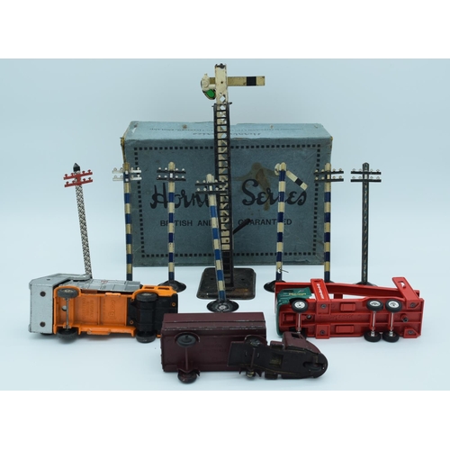 4486 - A collection of  model railway signals, a Hornby box and Corgi model trucks. (Qty)