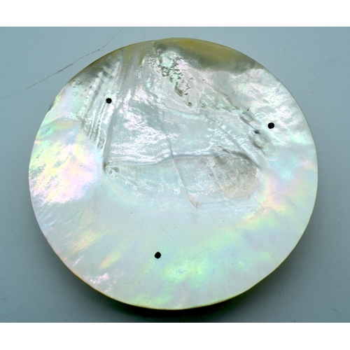 4491 - Four Mother of Pearl dishes Largest 18cm . (4)