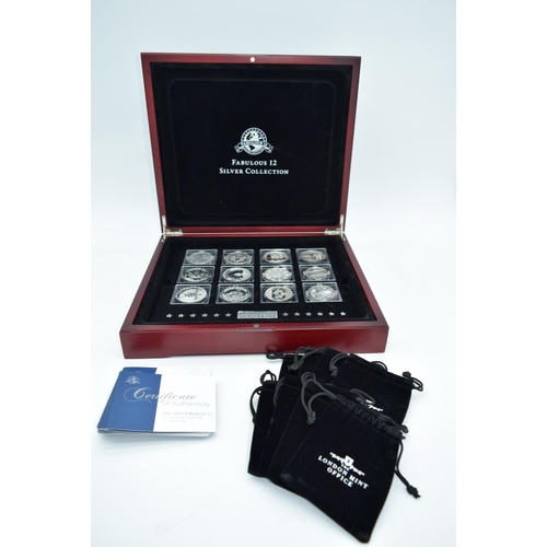 4557 - The Fabulous 12 boxed collection of silver coins with certificates (12).