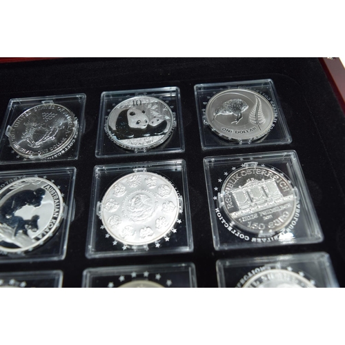 4557 - The Fabulous 12 boxed collection of silver coins with certificates (12).