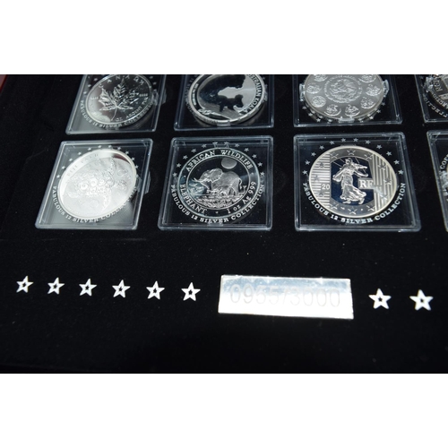 4557 - The Fabulous 12 boxed collection of silver coins with certificates (12).