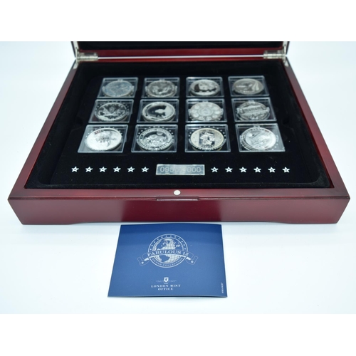 4557 - The Fabulous 12 boxed collection of silver coins with certificates (12).