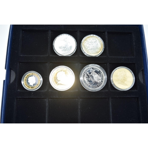 4558 - Two Cook island 1 dollar commemorative gold coins together with silver Britannia coins. (6)