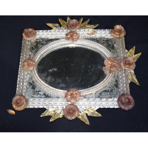 4608 - A glass framed mirror decorated with flowers and leaves 42 x 42cm .