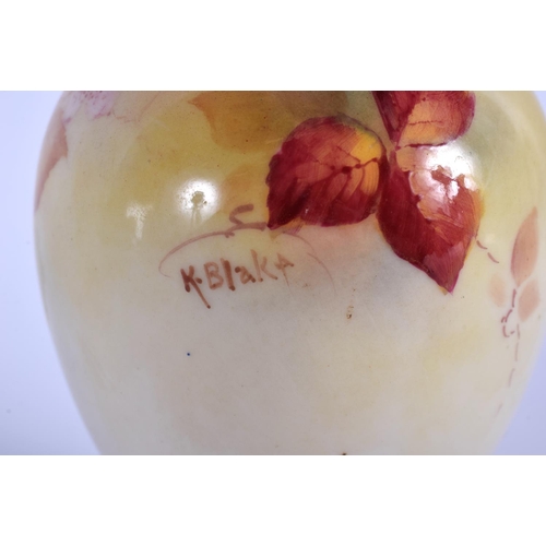 65 - A ROYAL WORCESTER FRUIT PAINTED VASE by Kitty Blake. 14 cm high.