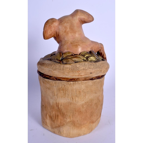 698 - AN ANTIQUE AUSTRIAN TOBACCO JAR AND COVER in the form of a pig in money. 22 cm high.