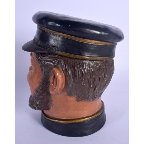 700 - AN ANTIQUE AUSTRIAN TOBACCO JAR AND COVER in the form of a bearded male. 21 cm high.