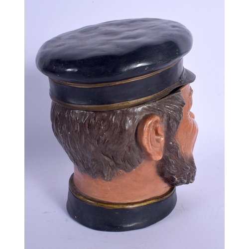 700 - AN ANTIQUE AUSTRIAN TOBACCO JAR AND COVER in the form of a bearded male. 21 cm high.