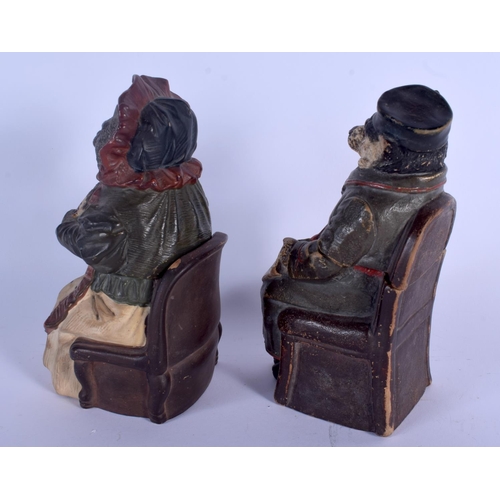 702 - A PAIR OF ANTIQUE AUSTRIAN TOBACCO JAR AND COVER in the form of  a dog and cat. 19 cm high.