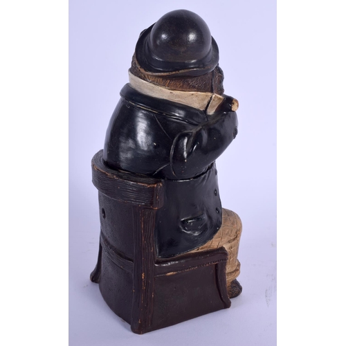 703 - AN ANTIQUE AUSTRIAN TOBACCO JAR AND COVER in the form of a pug dog. 19 cm high.