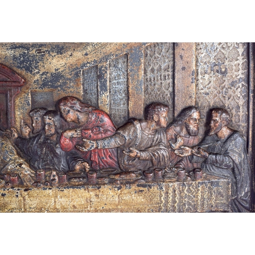 712 - A RARE 19TH CENTURY CONTINENTAL CAST IRON PANEL depicting the last supper. 65 cm x 37 cm.