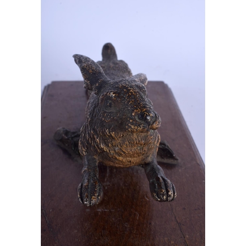 717 - A 19TH CENTURY AUSTRIAN COLD PAINTED BRONZE HARE modelled in a leaping stance. Bronze 25 cm wide.