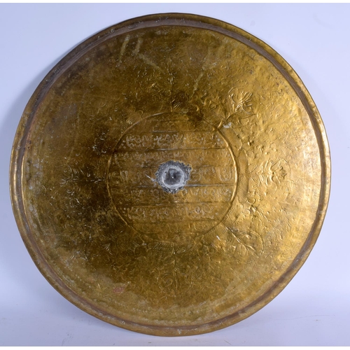 720 - THREE LARGE 19TH CENTURY MIDDLE EASTERN INDIAN BRASS ISLAMIC TRAYS. Largest 50 cm diameter. (3)