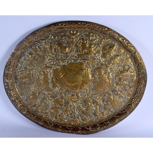 720 - THREE LARGE 19TH CENTURY MIDDLE EASTERN INDIAN BRASS ISLAMIC TRAYS. Largest 50 cm diameter. (3)