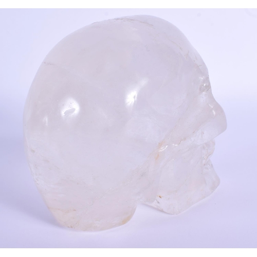 727 - A CONTINENTAL CARVED ROCK CRYSTAL SKULL. 11 cm x 11 cm.