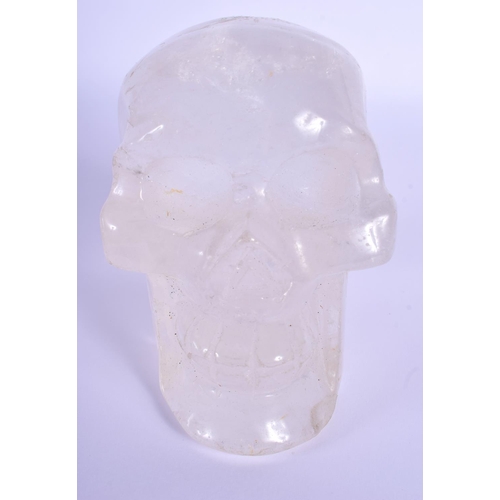 727 - A CONTINENTAL CARVED ROCK CRYSTAL SKULL. 11 cm x 11 cm.