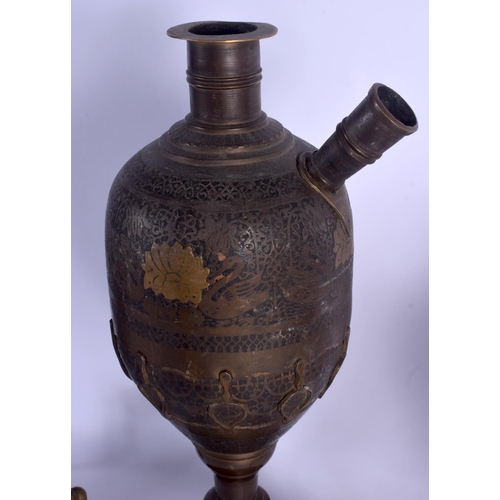 737 - A LARGE 19TH CENTURY MIDDLE EASTERN INDIAN BRONZE HOOKAH PIPE together with two others. Largest 44 c... 