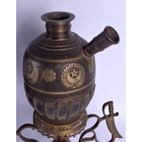 737 - A LARGE 19TH CENTURY MIDDLE EASTERN INDIAN BRONZE HOOKAH PIPE together with two others. Largest 44 c... 