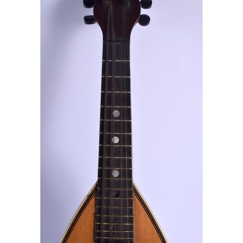 749 - A EUROPEAN MANDOLIN by Antonio Grauso. 60 cm long.