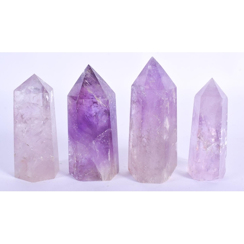 772 - FOUR CONTINENTAL AMETHYST OBELISKS. Largest 8 cm high. (4)