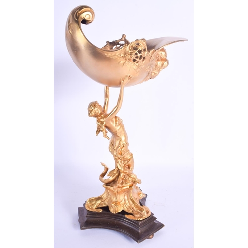 784 - A CONTEMPORARY GILT BRONZE FEMALE CENTREPIECE modelled holding aloft a cornucopia. 39 cm high.