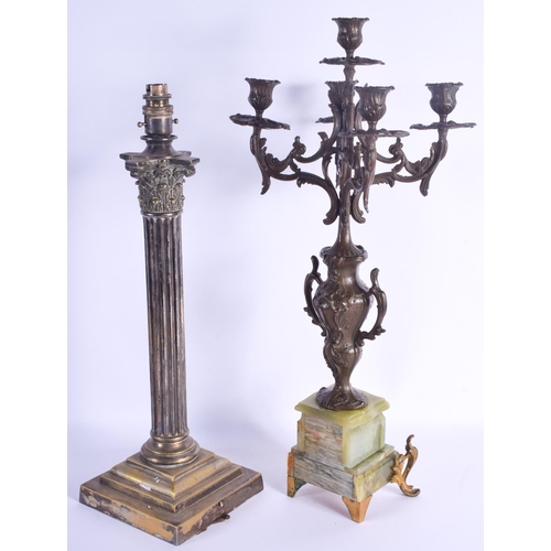 793 - A LARGE ANTIQUE SILVER PLATED CANDLESTICK LAMP together with a French candelabra Largest 54 cm high.... 