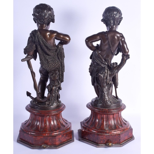 795 - A LARGE PAIR OF 19TH CENTURY FRENCH BRONZE FIGURES modelled upon red marble bases. 56 cm high.