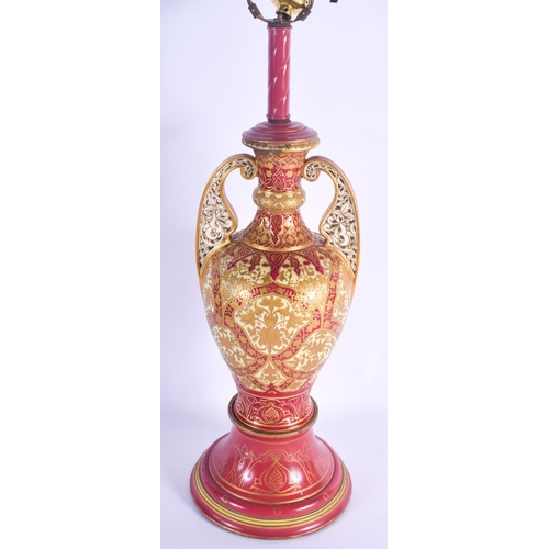 799 - A 19TH CENTURY HUNGARIAN TWIN HANDLED PORCELAIN ALHAMBRA VASE enamelled in gilt, converted to a lamp... 