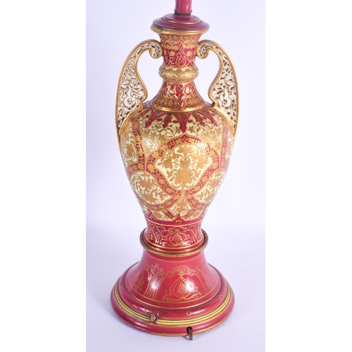 799 - A 19TH CENTURY HUNGARIAN TWIN HANDLED PORCELAIN ALHAMBRA VASE enamelled in gilt, converted to a lamp... 