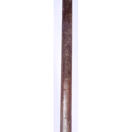 801 - A LARGE MAORI CARVED WOOD STAFF Taiaha, with shell inset eyes and carved zig zag spiralised motifs. ... 