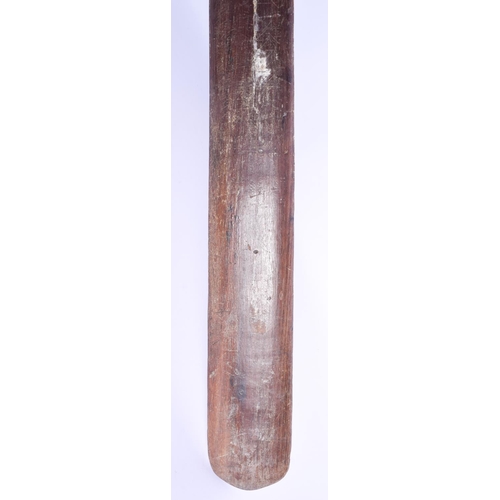 801 - A LARGE MAORI CARVED WOOD STAFF Taiaha, with shell inset eyes and carved zig zag spiralised motifs. ... 